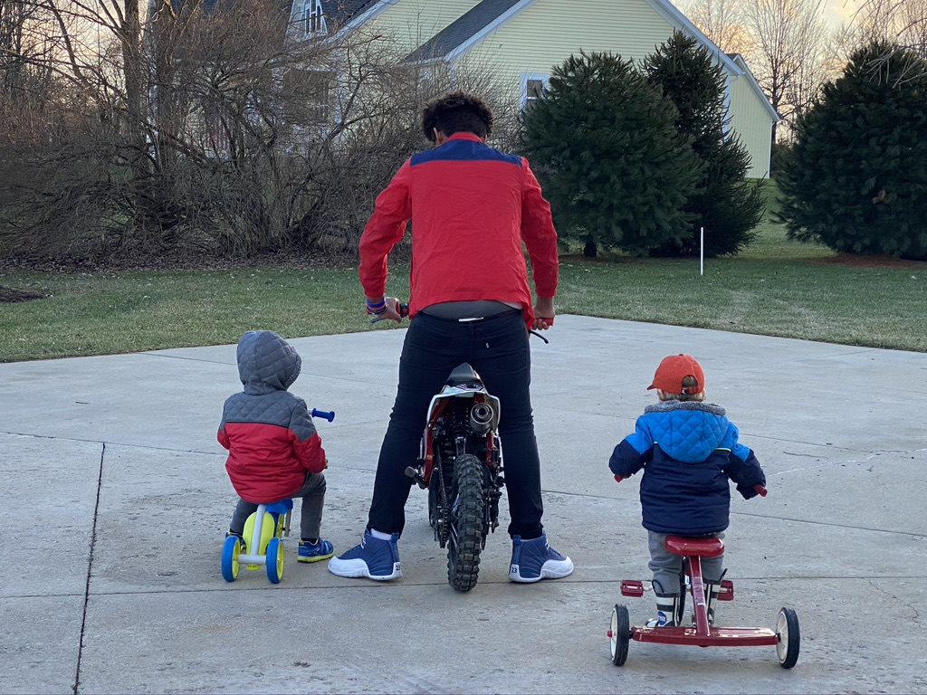 Leave the Pain blog featured image. Photo of 3 boys riding away on bikes.