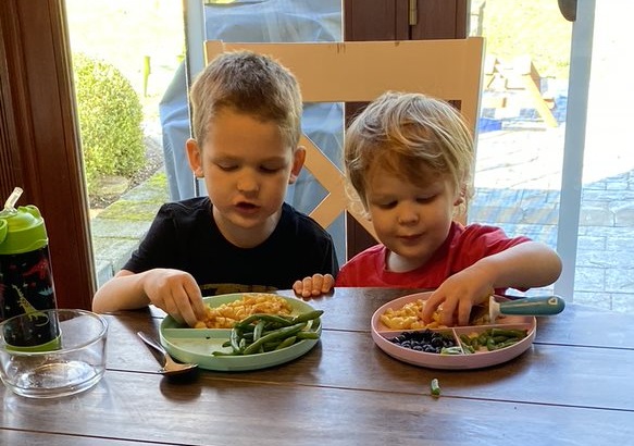 Stand Your Sacred Ground Blog featured image. Photo of Jessie's sons eating lunch.