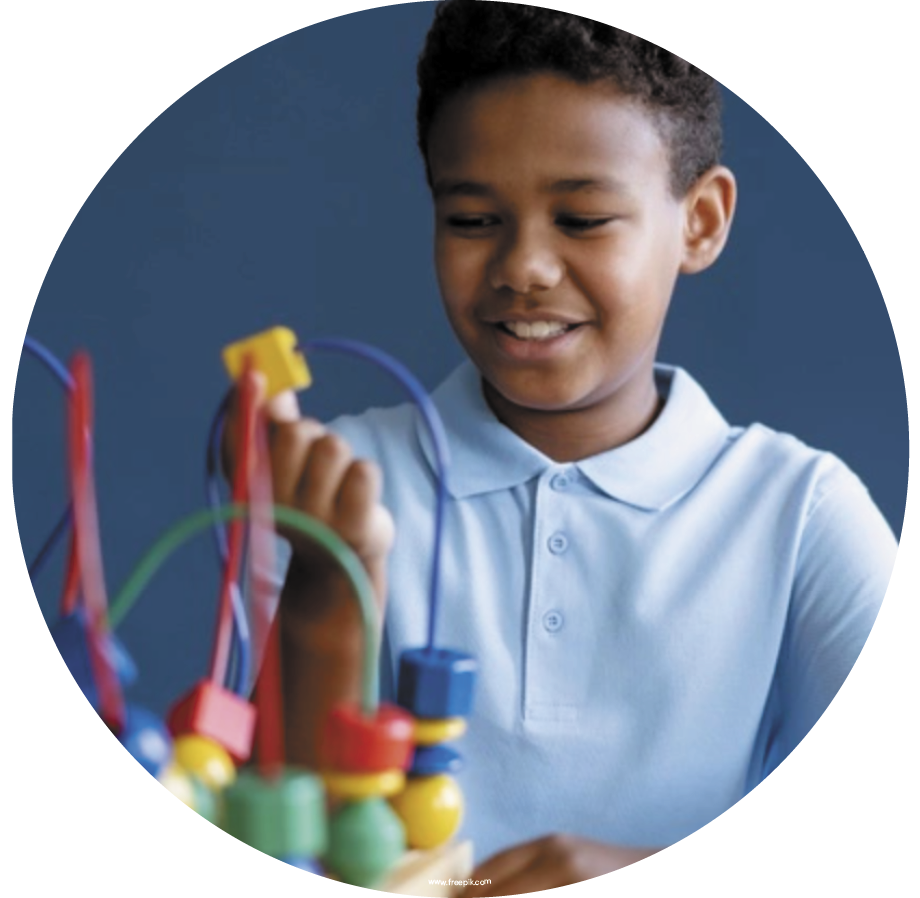 ABA Therapy Methodology Basics blog. Image of a young boy playing with a toy.