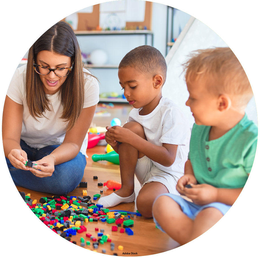 What to do After an Autism Diagnosis blog image. Photo of a teacher playing with children.