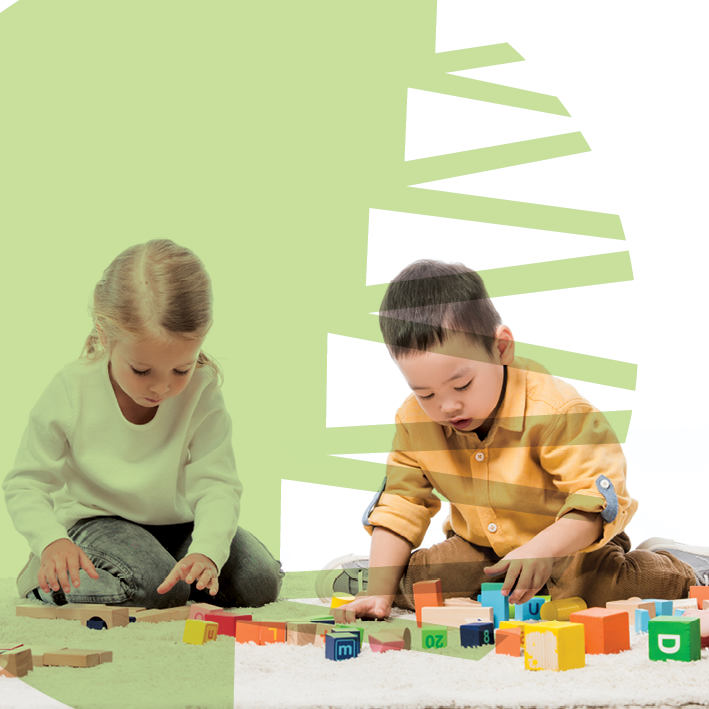 Autism Differences in Boys & Girls blog image. Photo of a boy and girl playing with blocks.